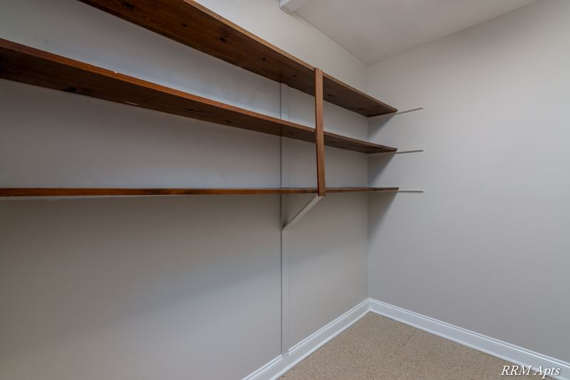 Walk-in pantry with wood shelves, Cook Street apartment 6